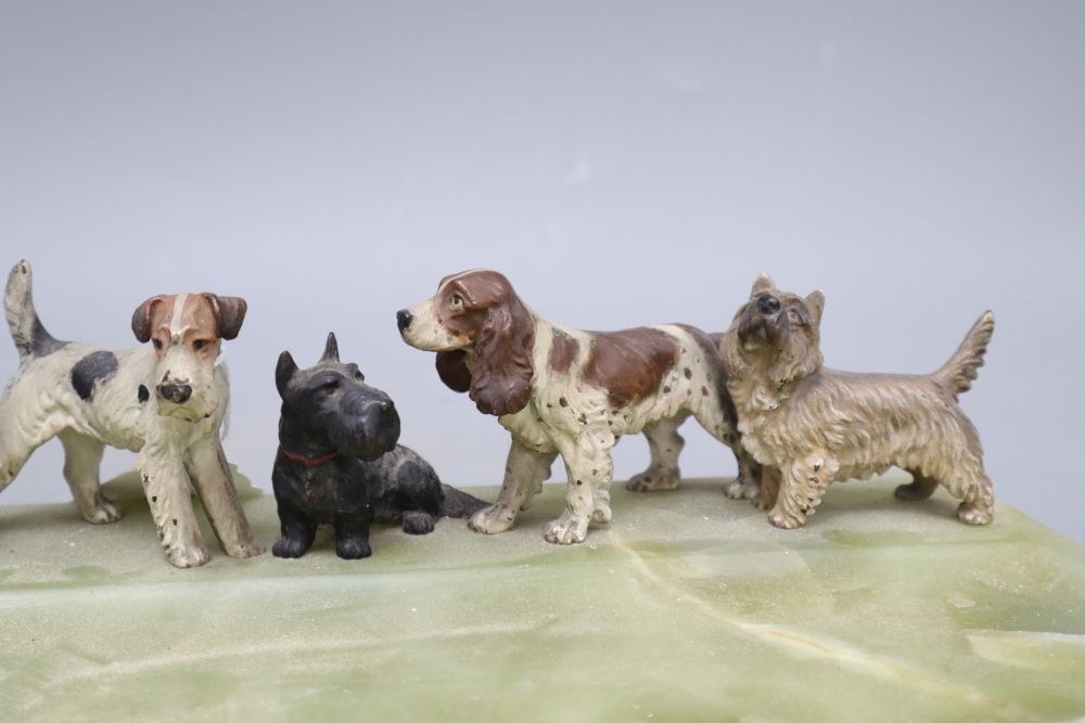 A cold painted bronze dish, modelled with terriers and a spaniel, length 36cm